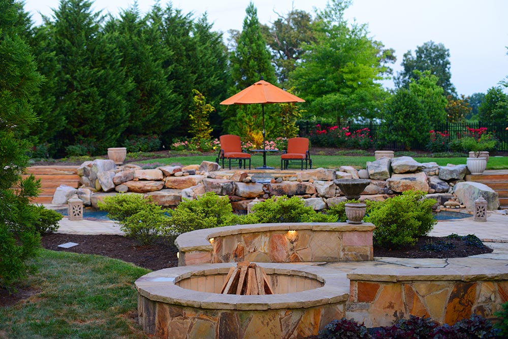 Natural stone fire pit construction for the landscape.